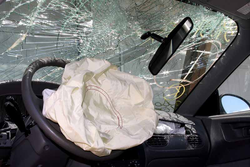 Look inside a wrecked car with airbag deployed.
